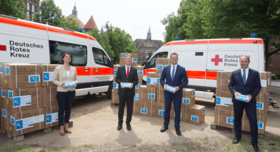 Bundesgesundheitsminister Jens Spahn, BASF-Chef Martin Brudermüller und Vertreter des Deutschen Roten Kreuzes